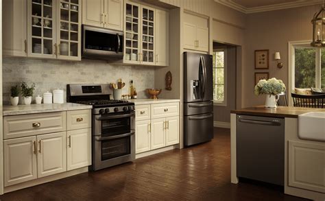 cream kitchen cabinets with black stainless steel appliances|black stainless steel kitchen cabinets.